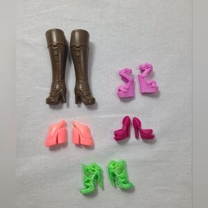 Assortment of barbie shoes- 5 pairs